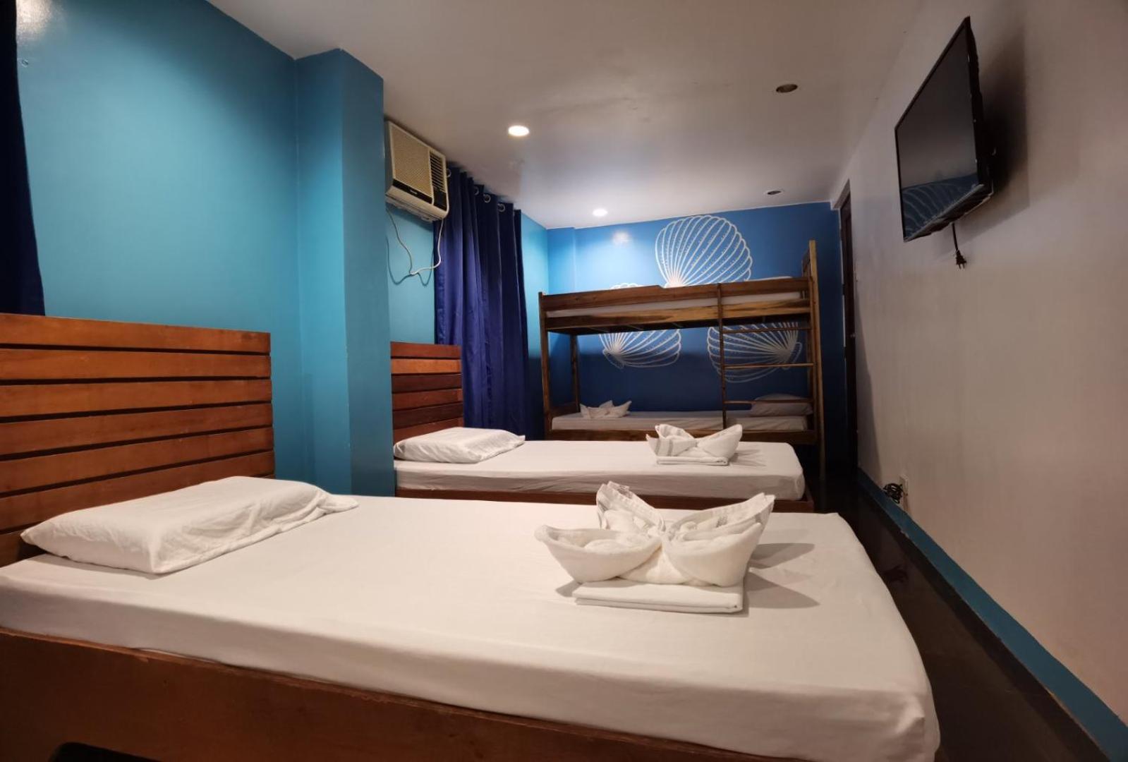 Amos Pili Tree Inn Powered By Cocotel Эль-Нидо Номер фото