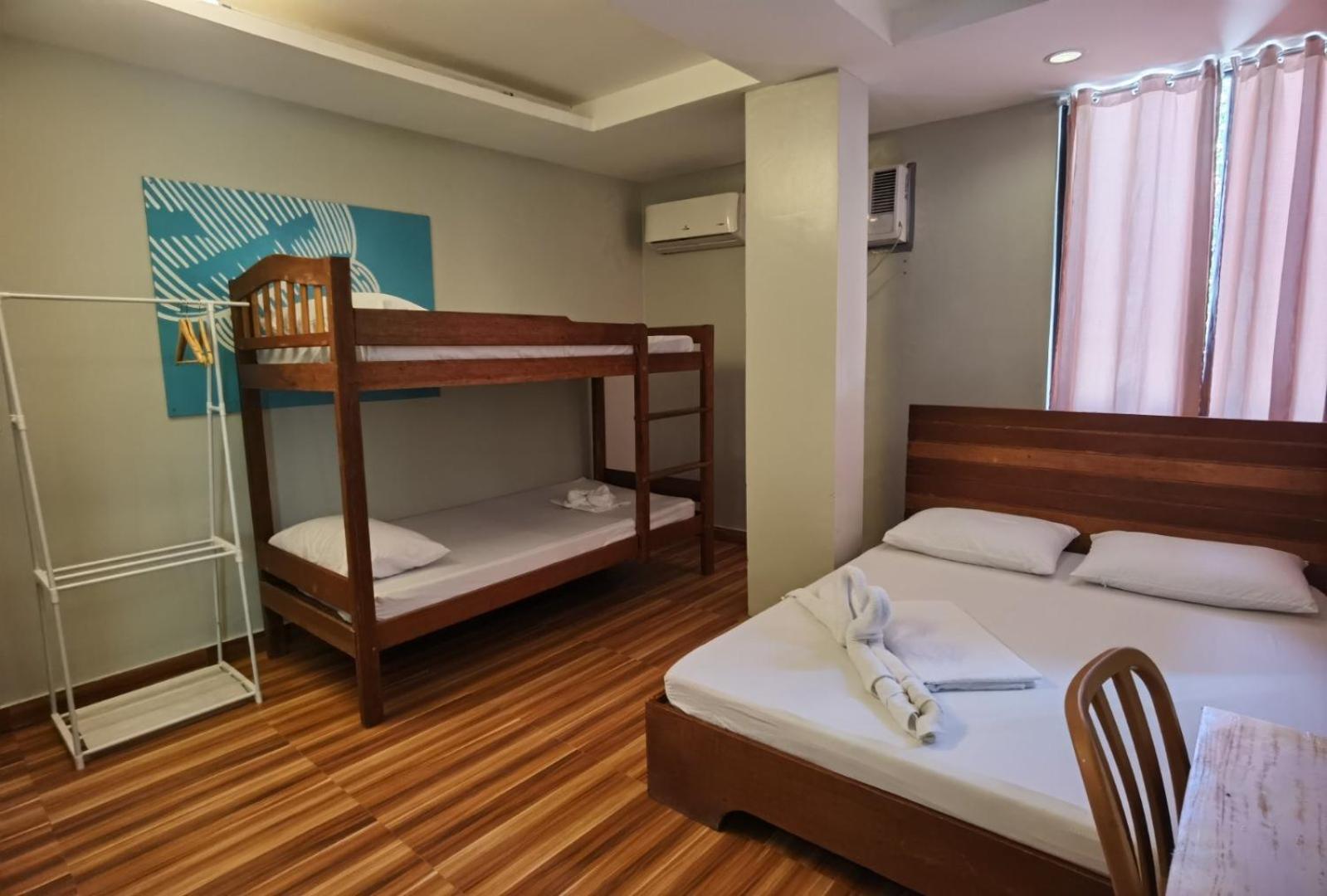 Amos Pili Tree Inn Powered By Cocotel Эль-Нидо Номер фото