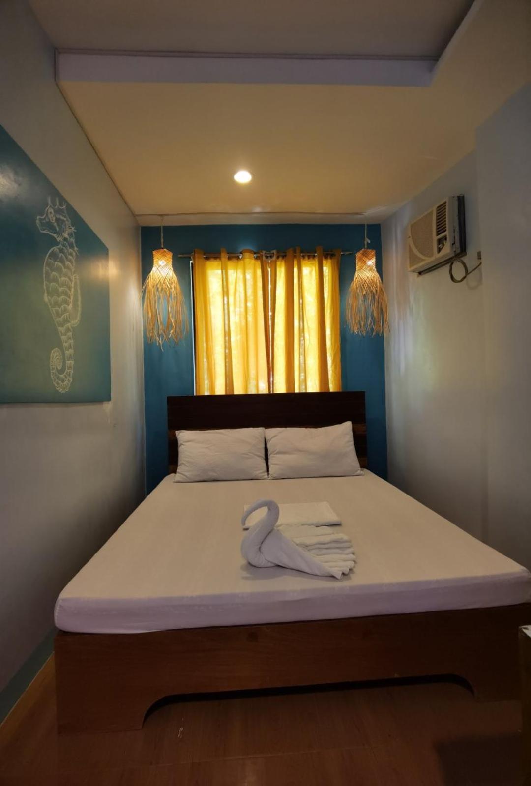 Amos Pili Tree Inn Powered By Cocotel Эль-Нидо Номер фото