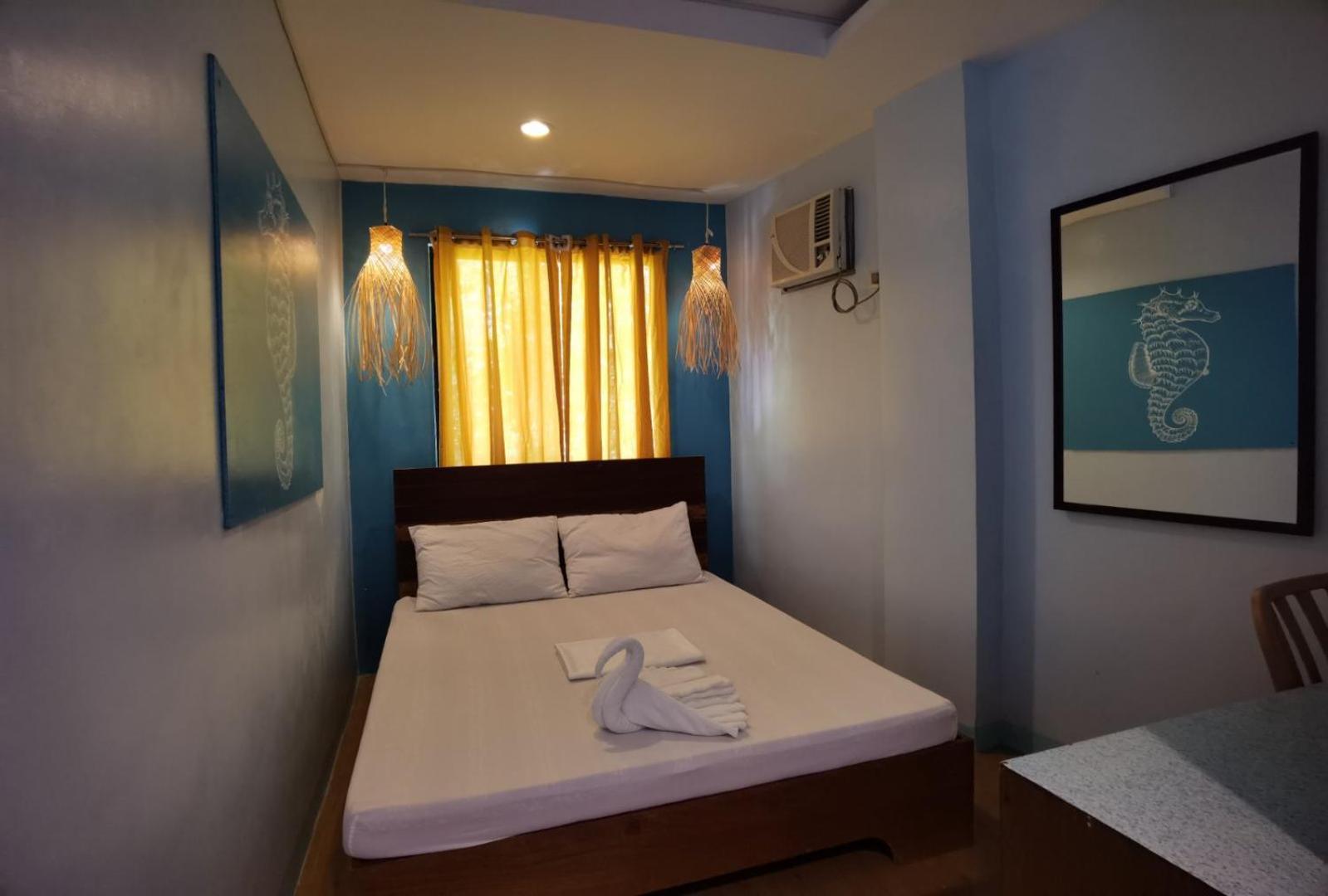 Amos Pili Tree Inn Powered By Cocotel Эль-Нидо Номер фото