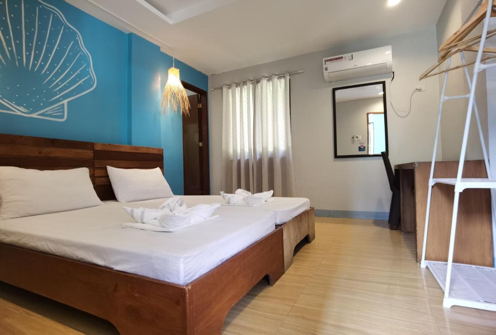 Amos Pili Tree Inn Powered By Cocotel Эль-Нидо Номер фото