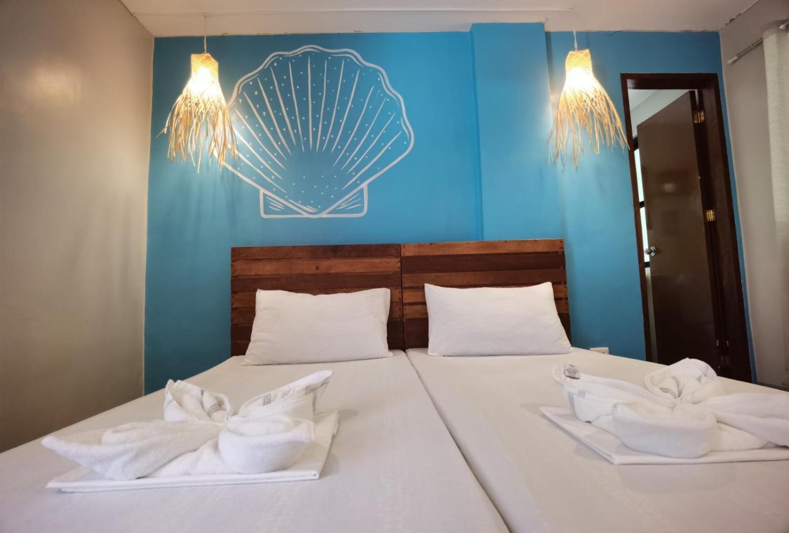 Amos Pili Tree Inn Powered By Cocotel Эль-Нидо Номер фото