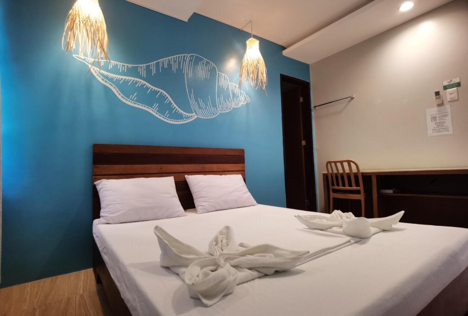 Amos Pili Tree Inn Powered By Cocotel Эль-Нидо Номер фото